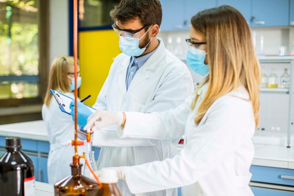 group-of-young-researchers-analyzing-chemical-data-ATH4WS6.jpg